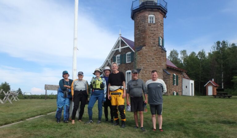 Club members tour the lighthouse on Raspberry Island during an Apostle Islands trip.